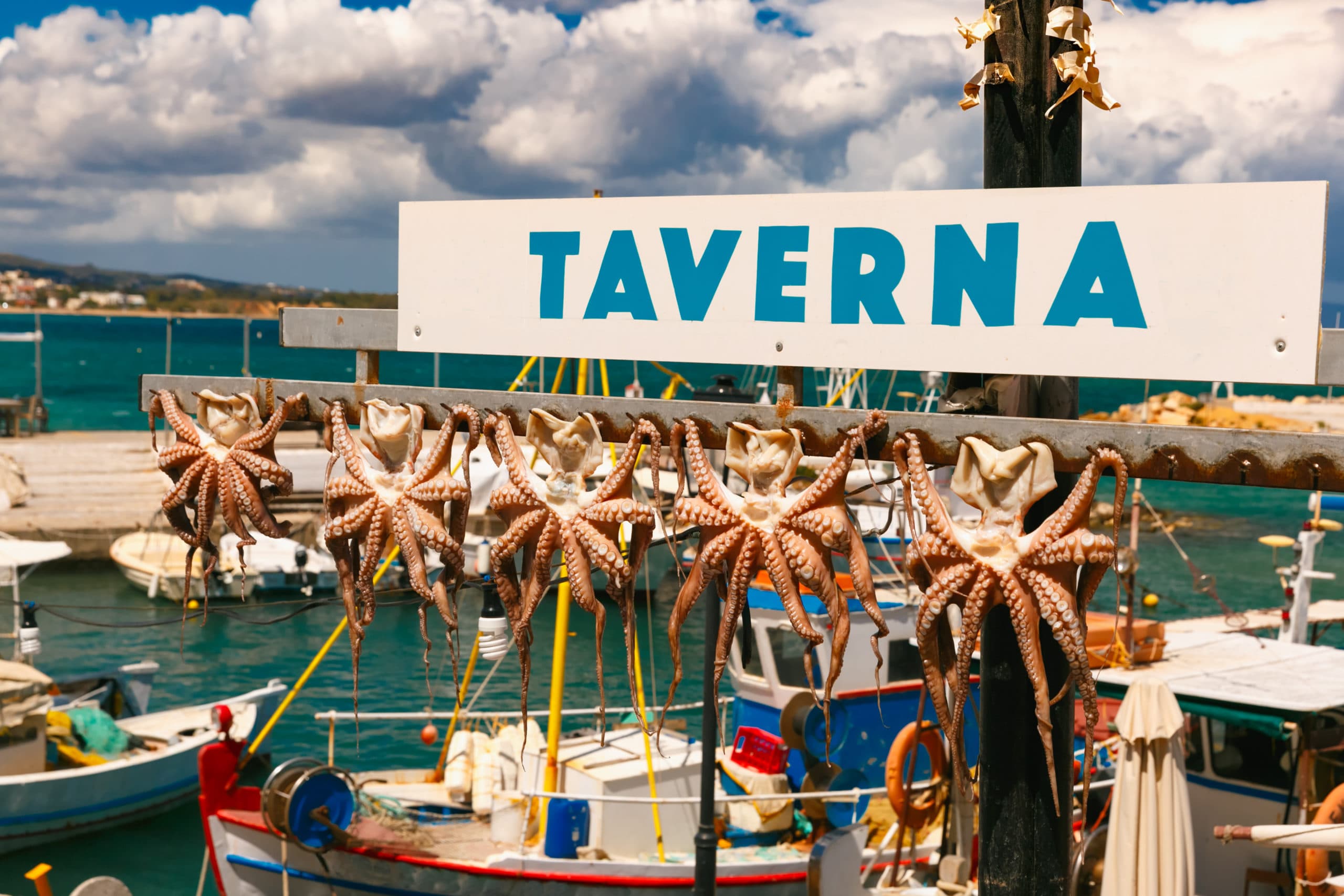 Drying,Octopus,,Traditional,Greek,Seafood,And,Taverna,In,Harbour,Of