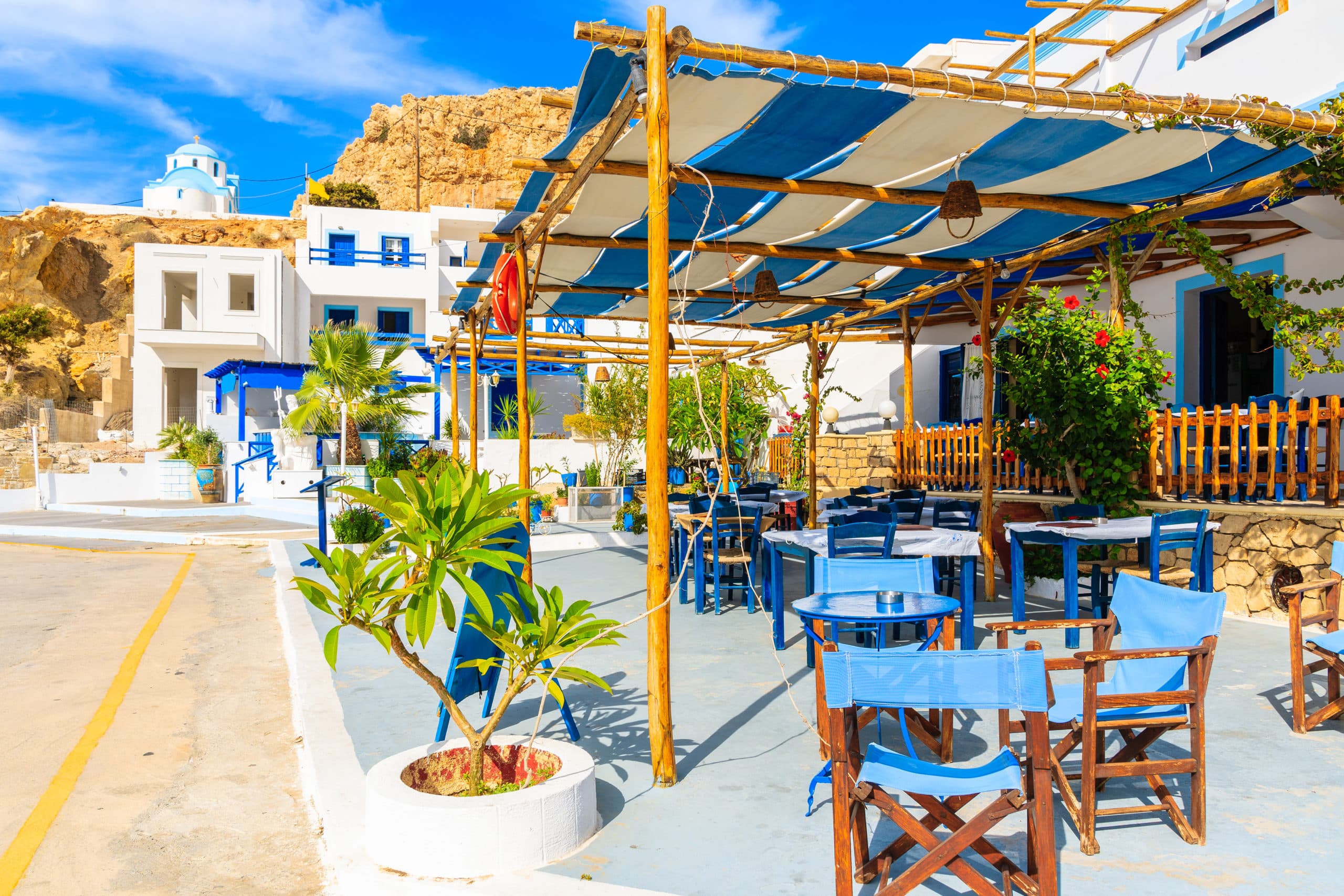 Chairs,And,Tables,In,Typical,Greek,Taverna,On,Street,Of