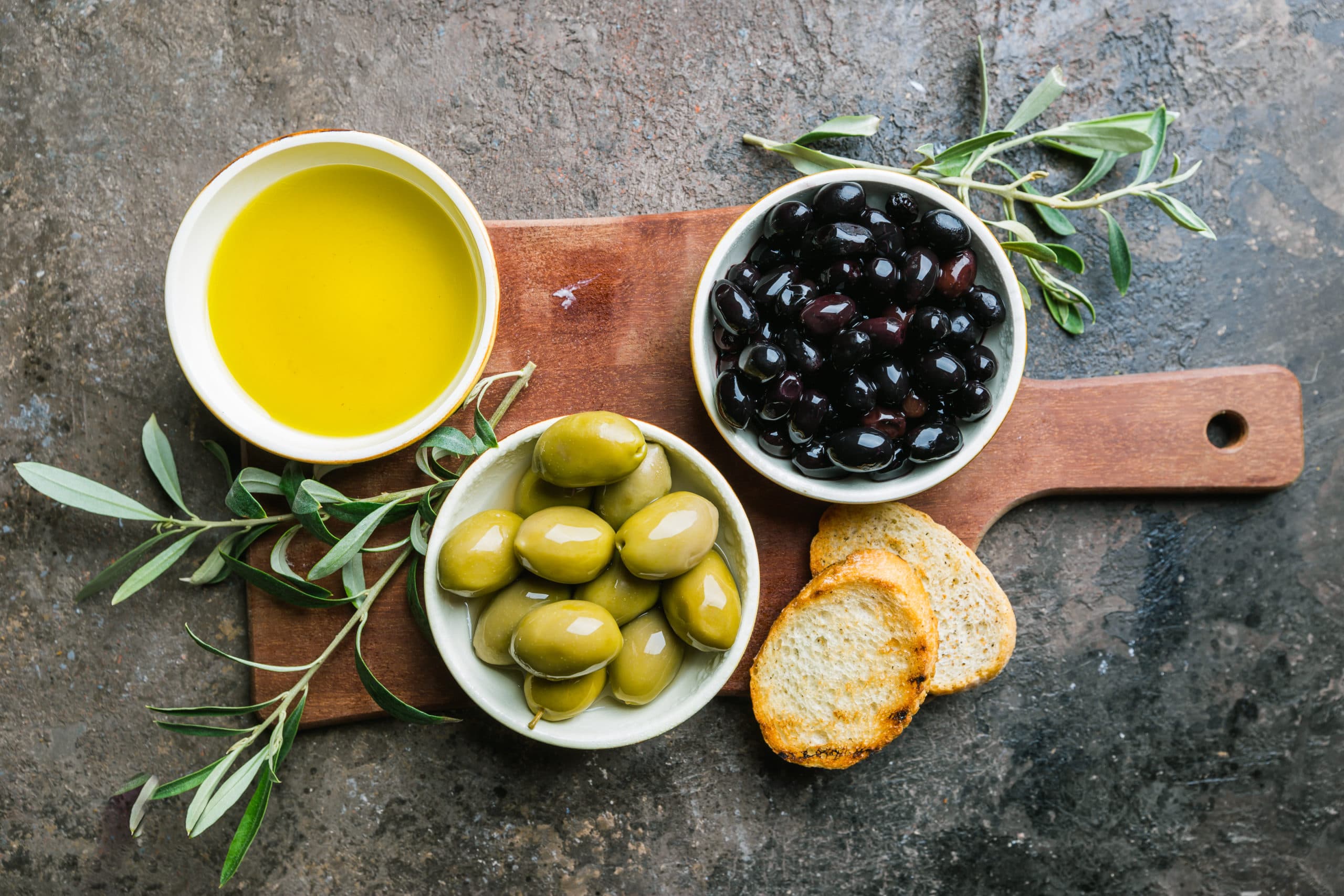 A,Set,Of,Green,And,Black,Olives,And,Olive,Oil
