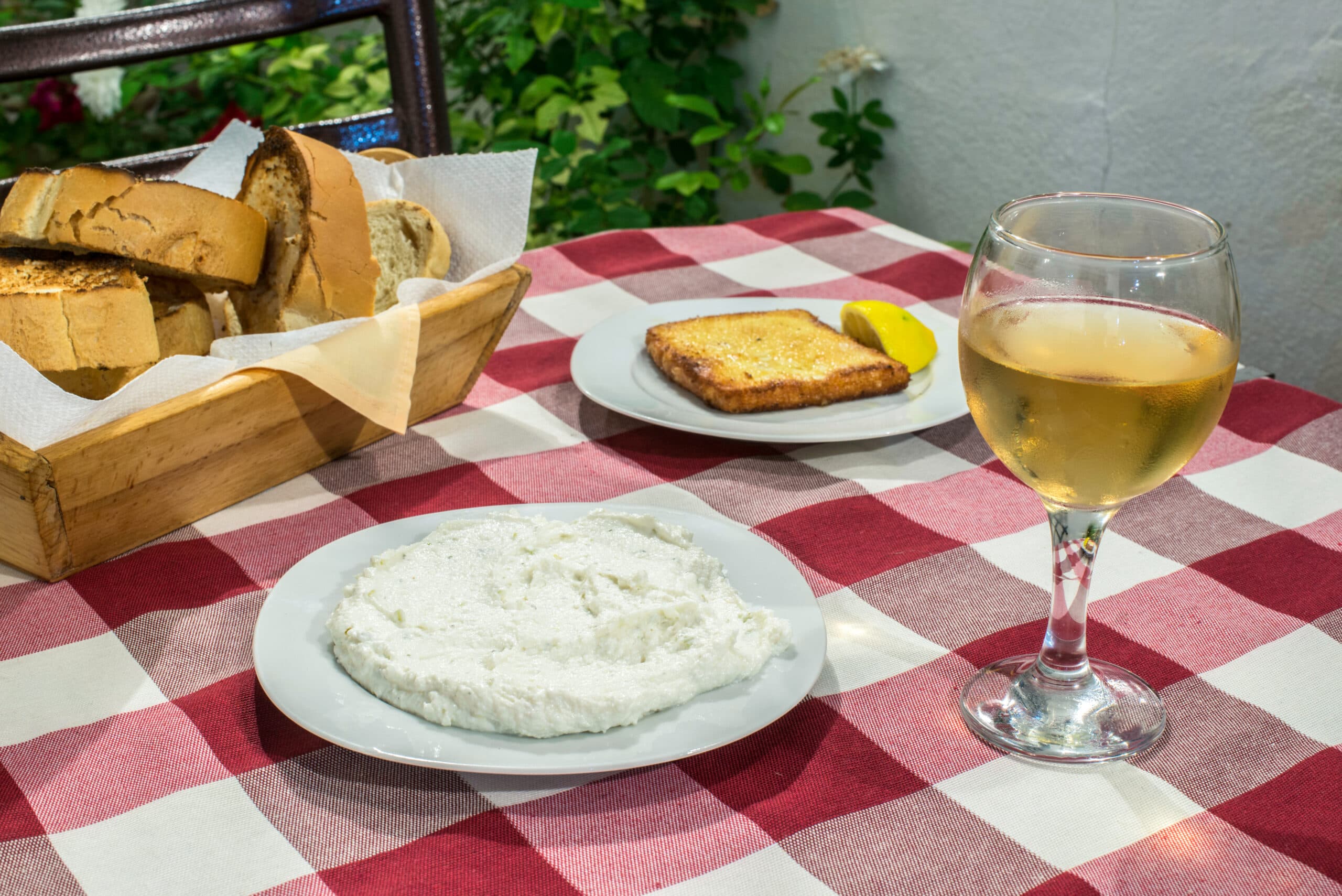 Table,In,Restaurant,In,Greece.,Red,Cover,And,Glass,Of