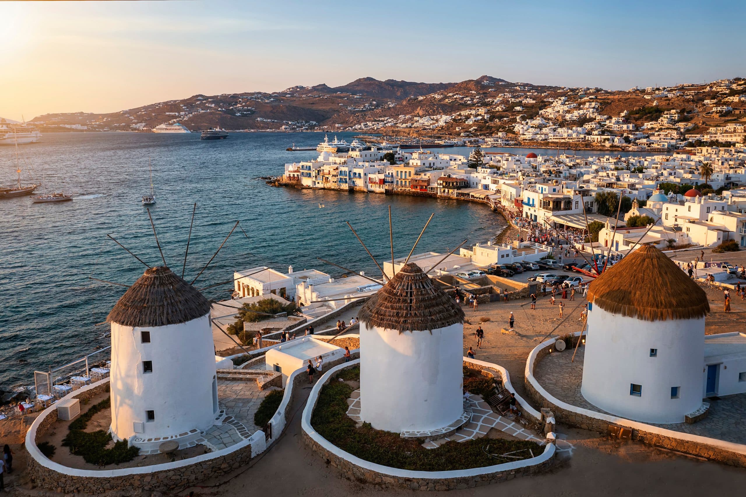 Aerial,View,Through,The,Famous,Windmills,Above,Mykonos,Town,,Cyclades,