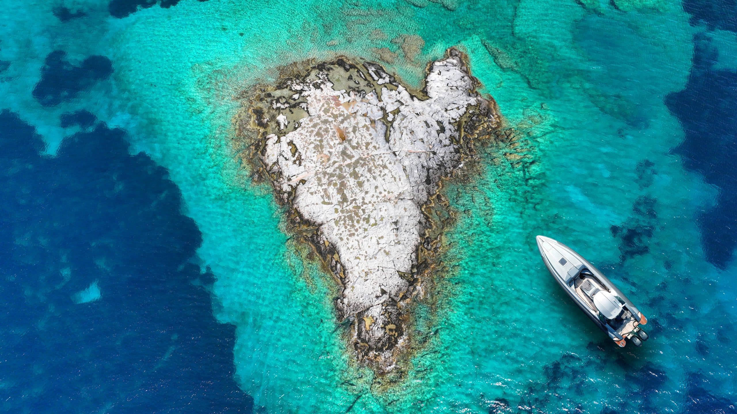 Aerial,Drone,Top,Down,Photo,Of,Inflatable,Rib,Anchored,In