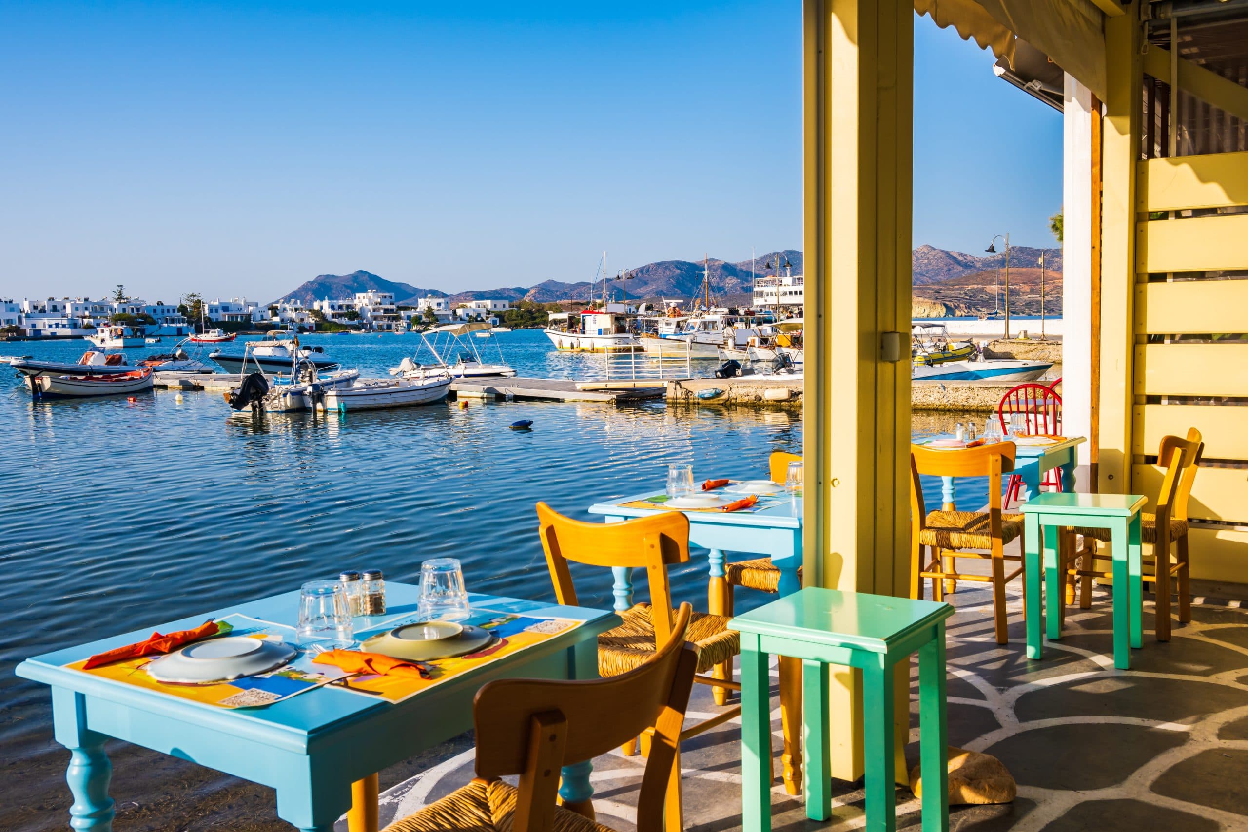 Tables,And,Chairs,In,Typical,Greek,Taverna,Restaurant,In,Pollonia