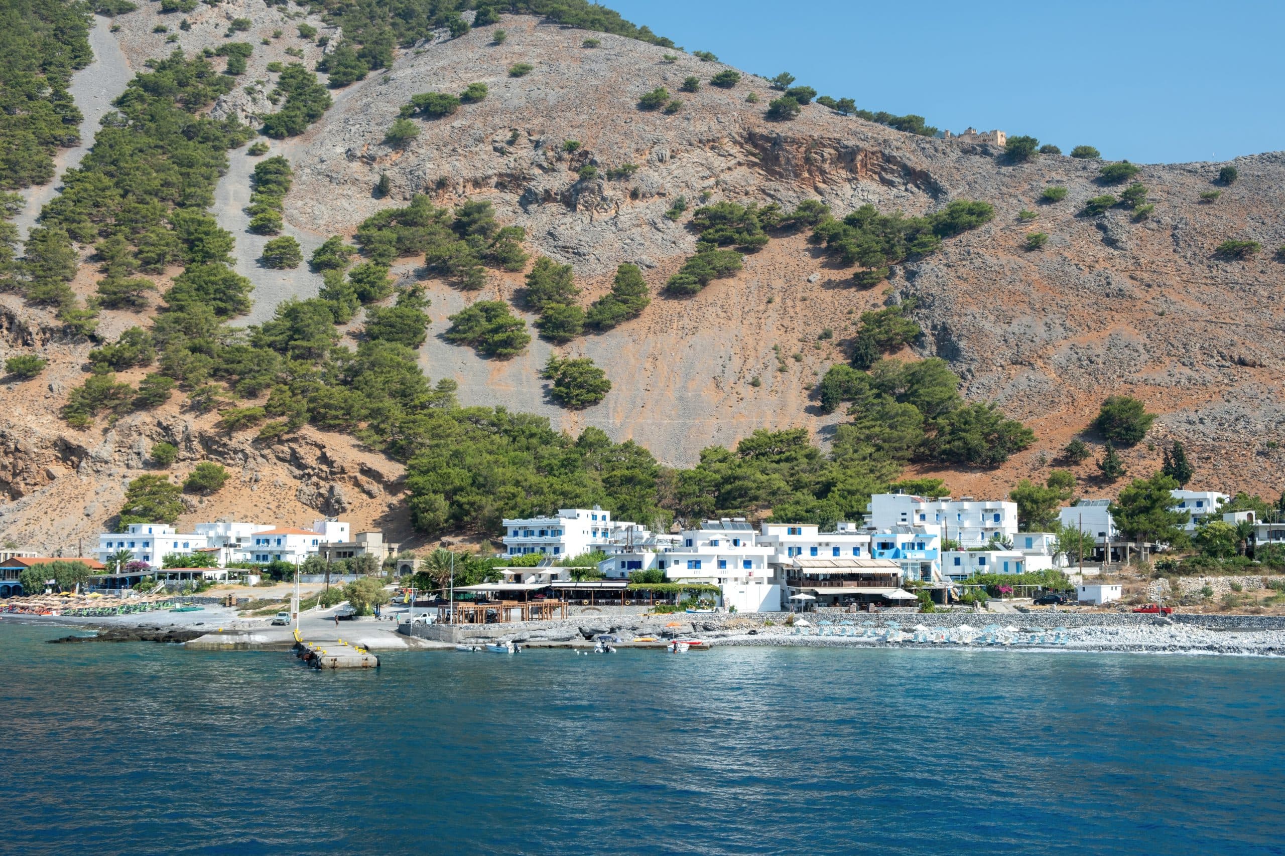 Agia,Roumeli,Village,At,The,Base,Of,Steep,Rugged,Mountains