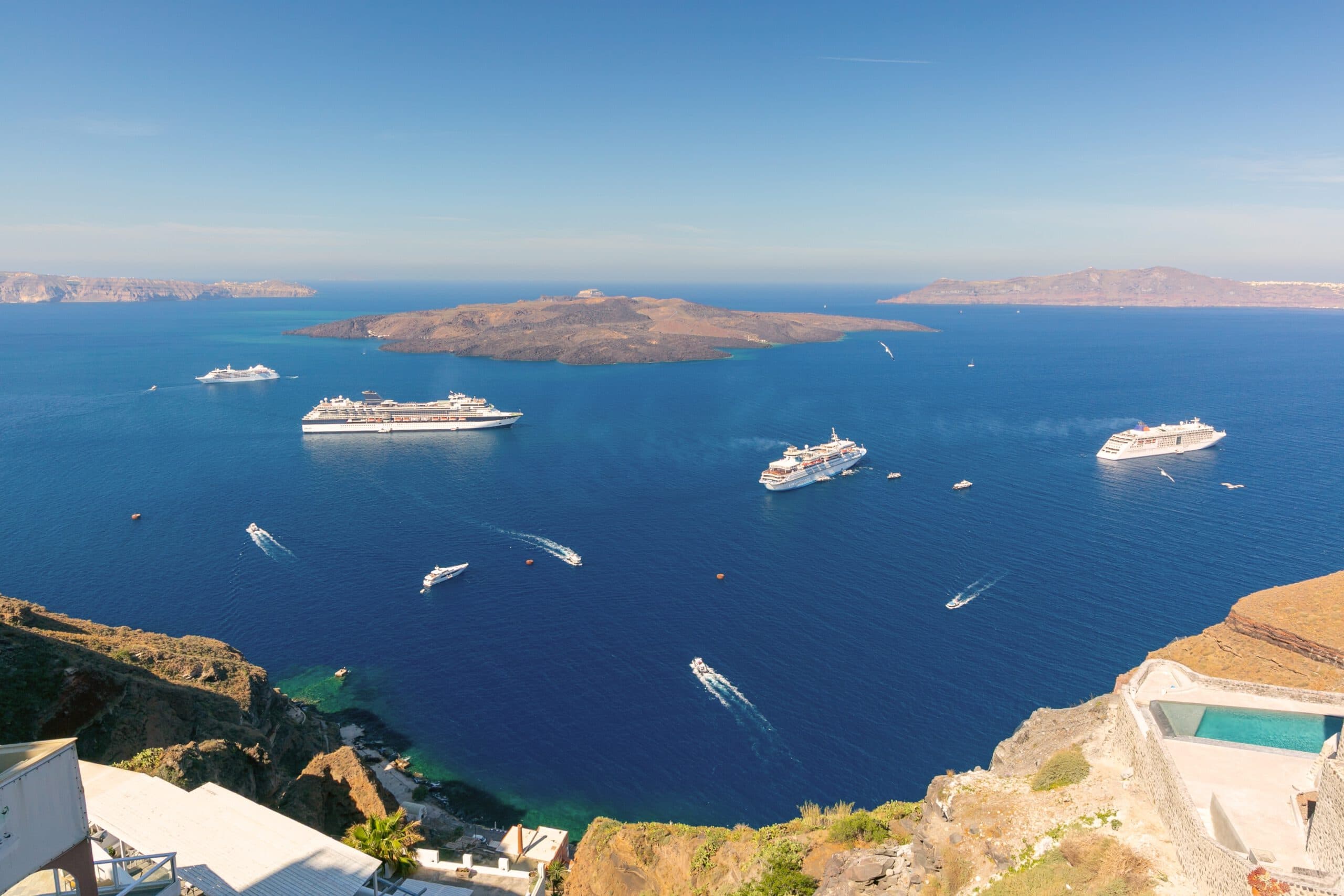 Multiple,Cruise,Ships,Anchored,In,The,Caldera,Near,Santorini,,Greece