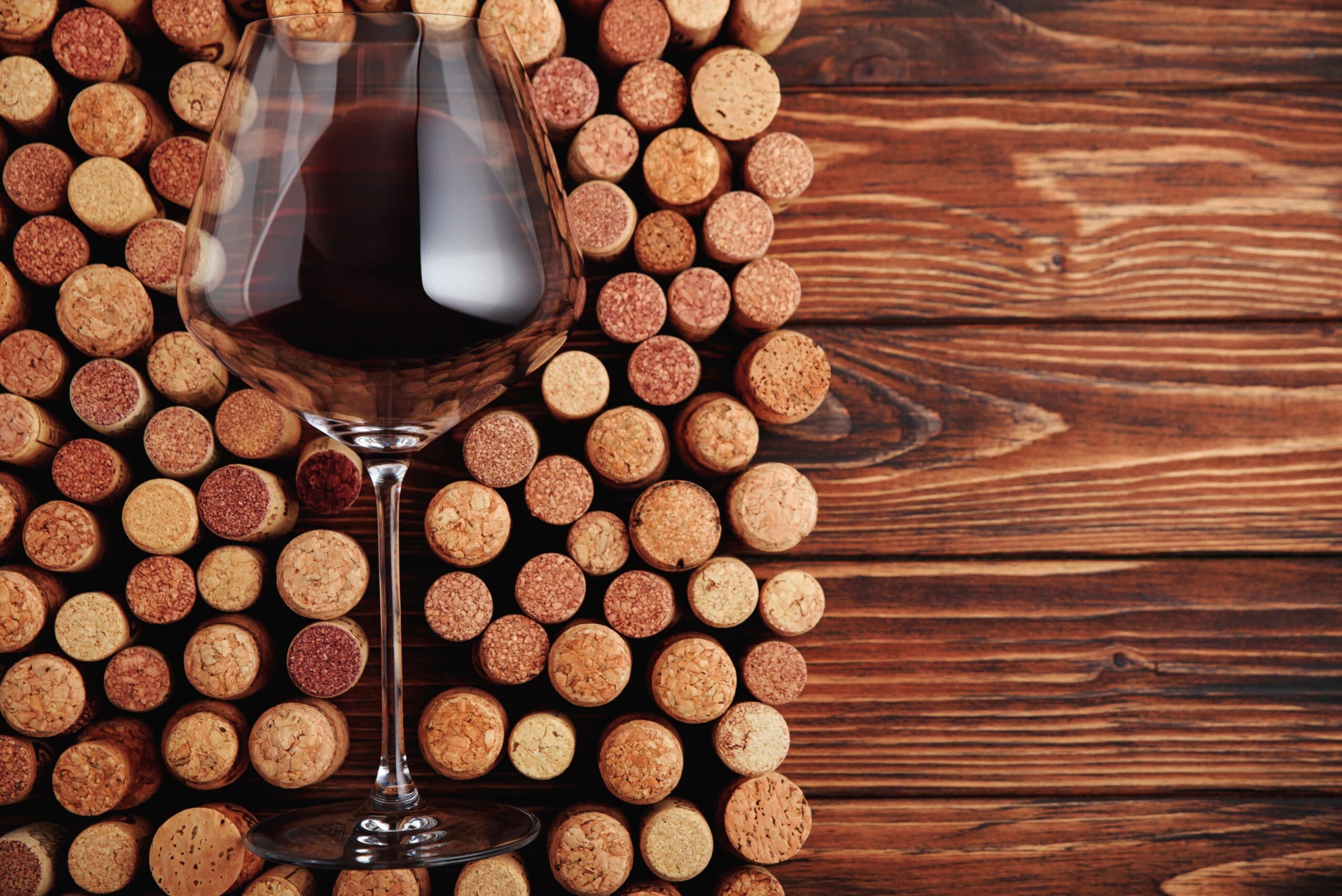 Red,Wine,In,A,Glass,Reflecting,Light,,Surrounded,By,A