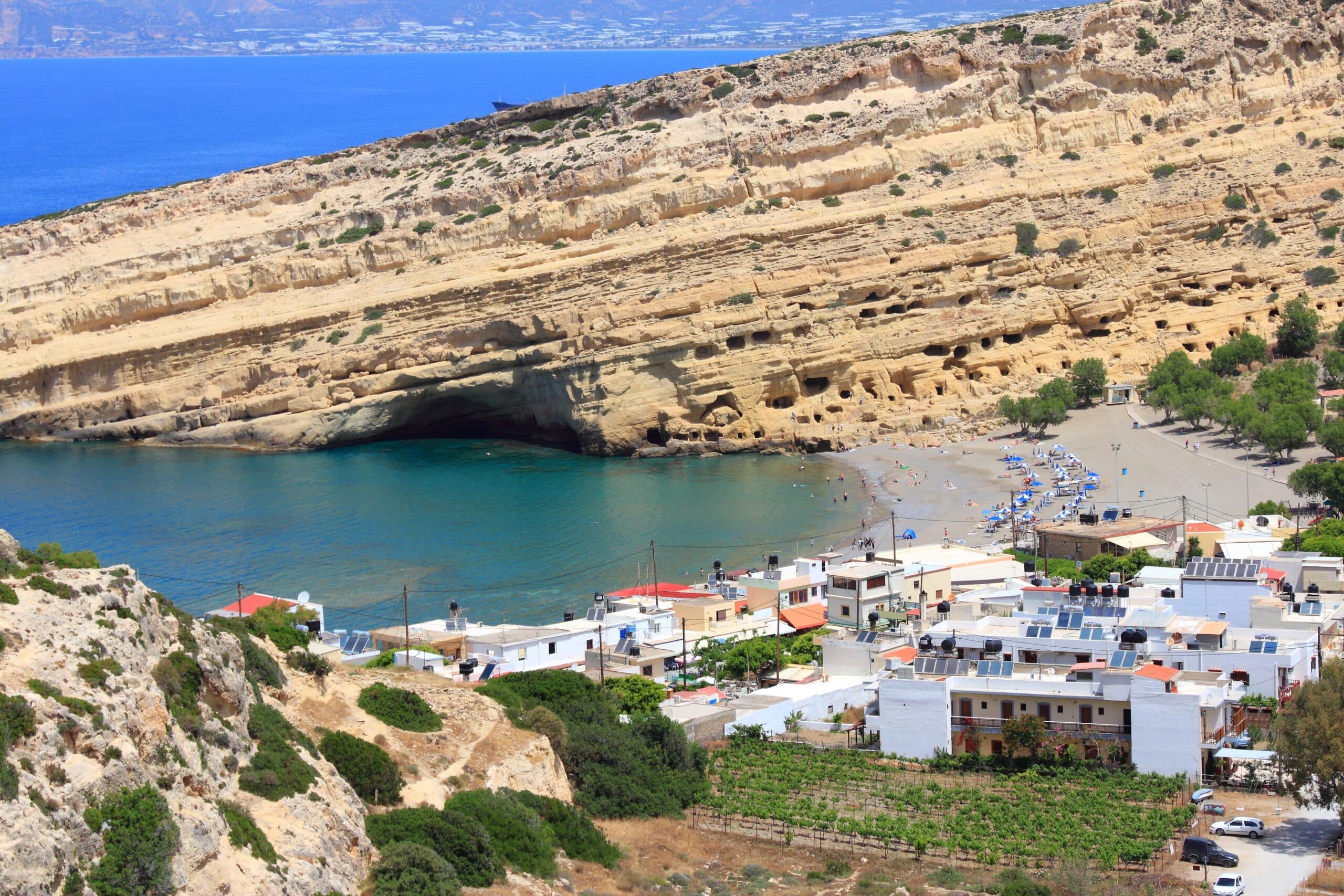 Matala,,Crete,-,Aerial,View,Of,Town,And,Beach.