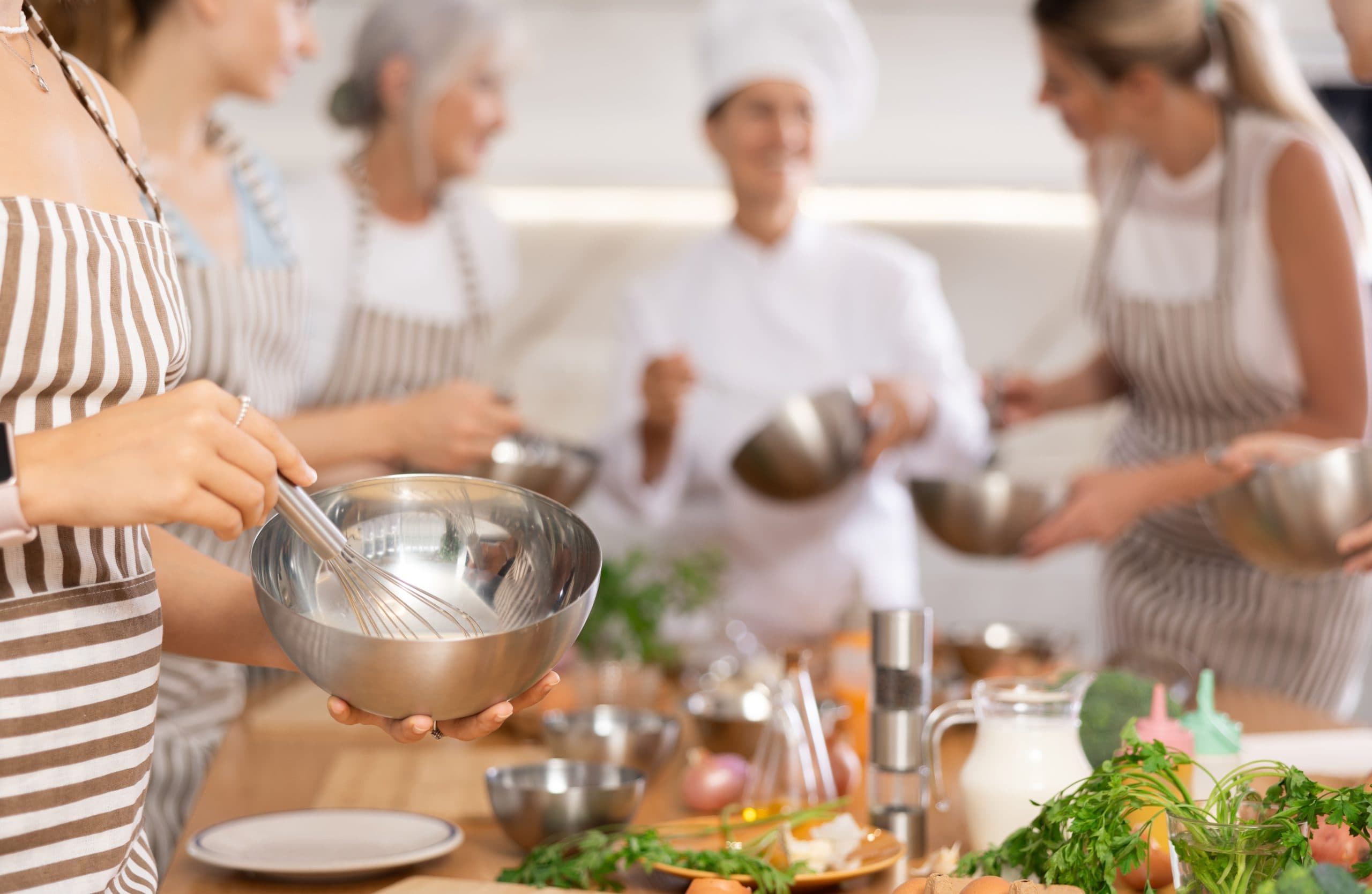 Young,Woman,In,Apron,Learning,To,Cook,At,Cooking,Master