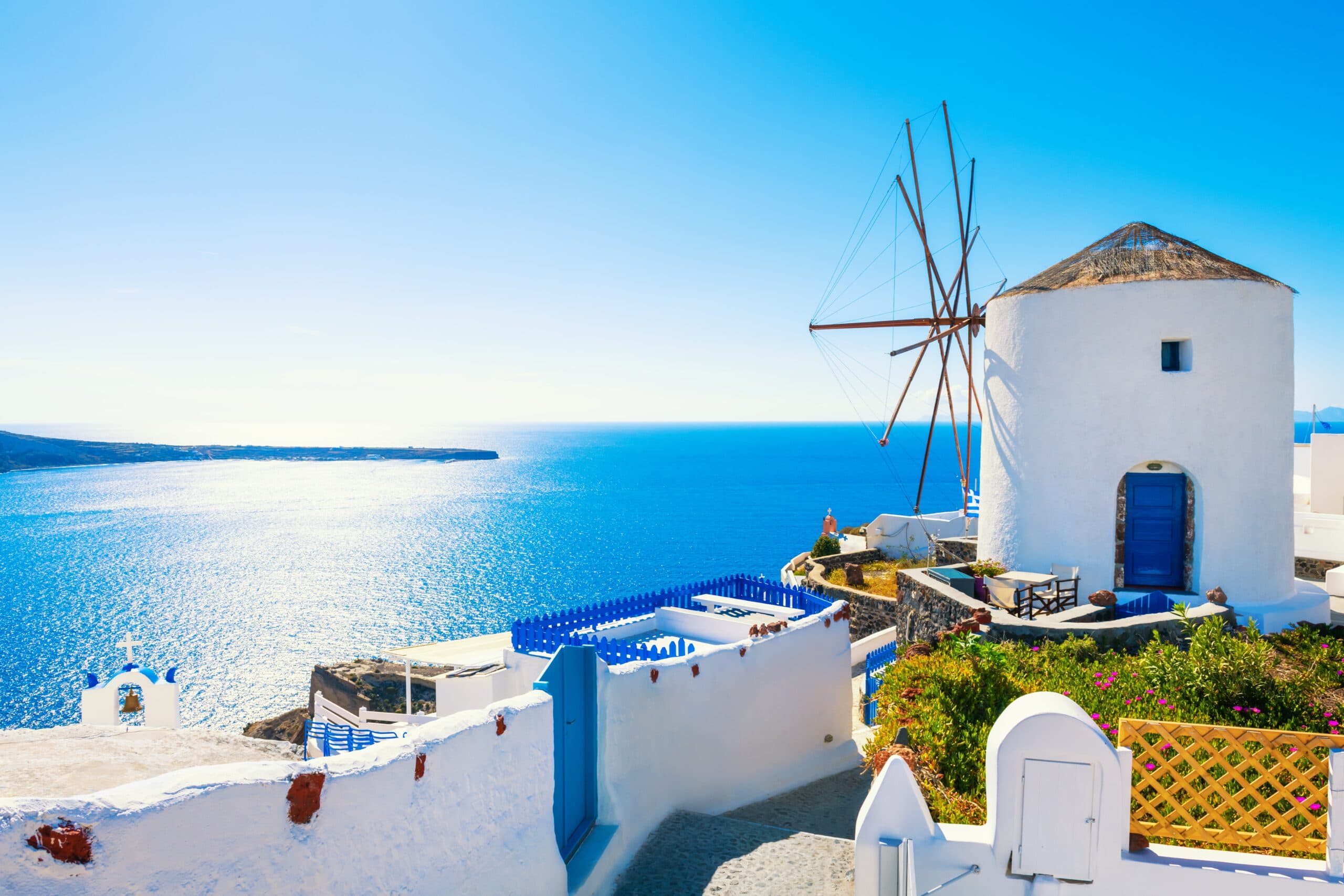 White,Architecture,In,Santorini,Island,,Greece.,Windmill,In,Oia,Town