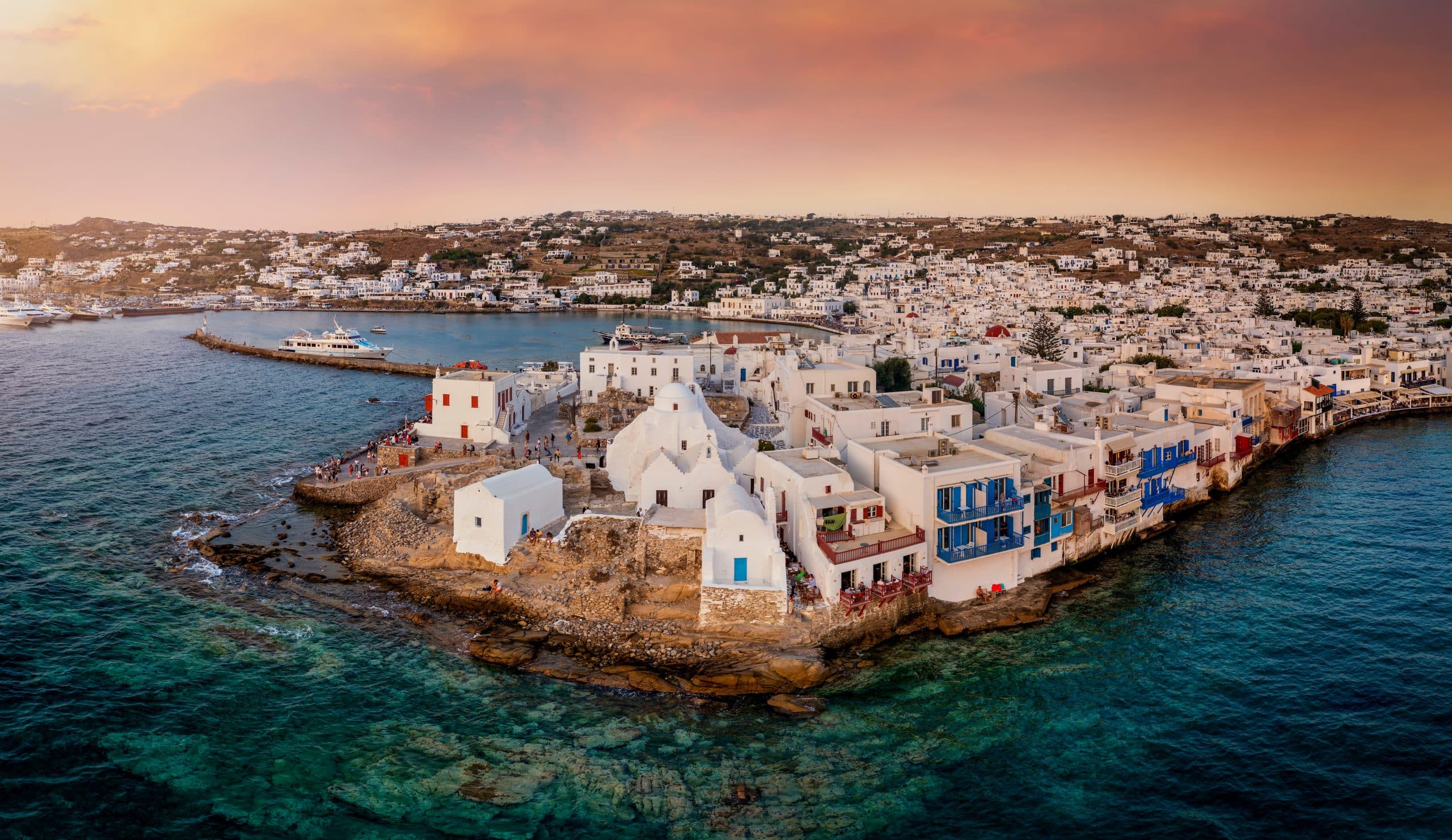 Aerial,Sunset,View,Of,The,Paraportiani,Church,Located,Within,The