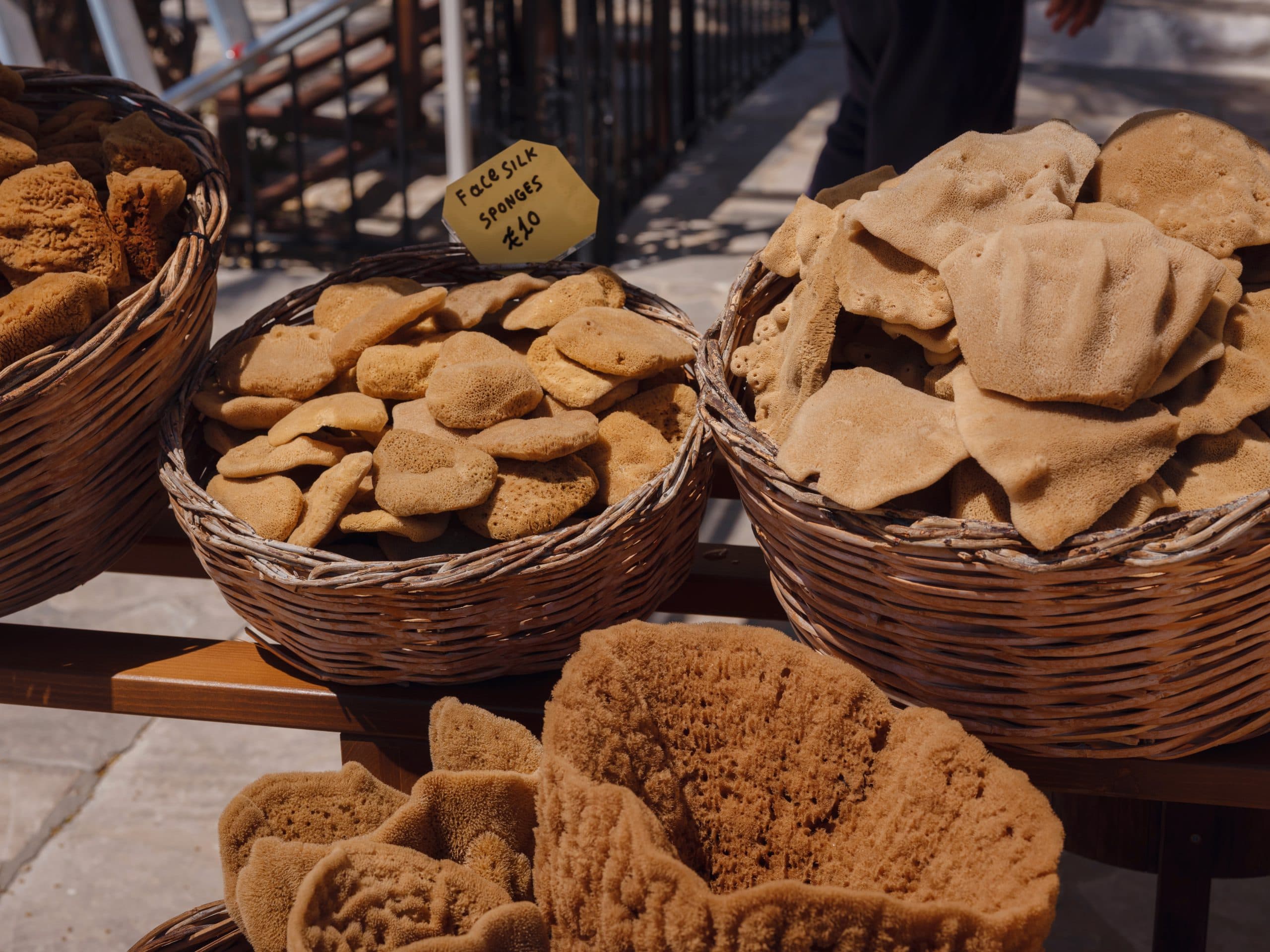 Wicker,Baskets,Filled,With,Natural,Greek,Sponges,At,The,Gift